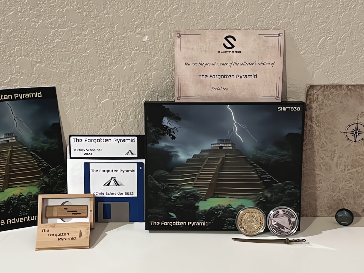 An arrangement of boxes, manuals, and USB drives representing various Kickstarter reward tiers