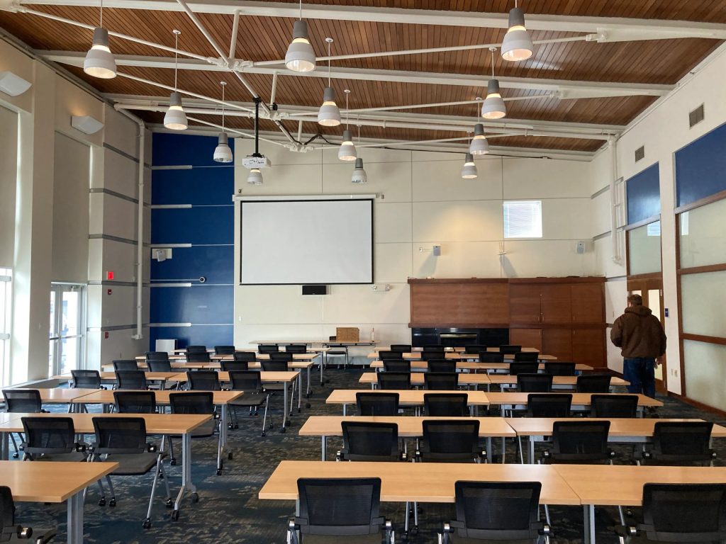 A classroom with desks and tables