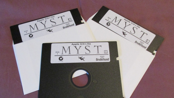 Three 5.25" floppy disks with Myst labels on them