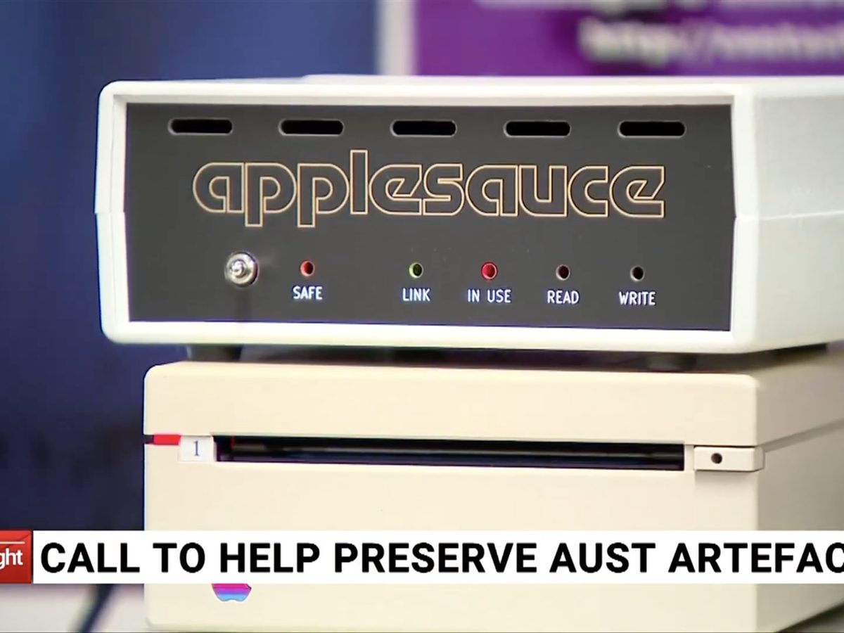 An Applesauce box sitting atop a floppy disk drive