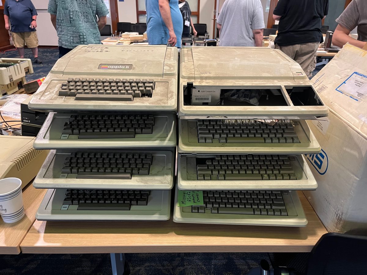 A two-by-four stack of dirty Apple II base units
